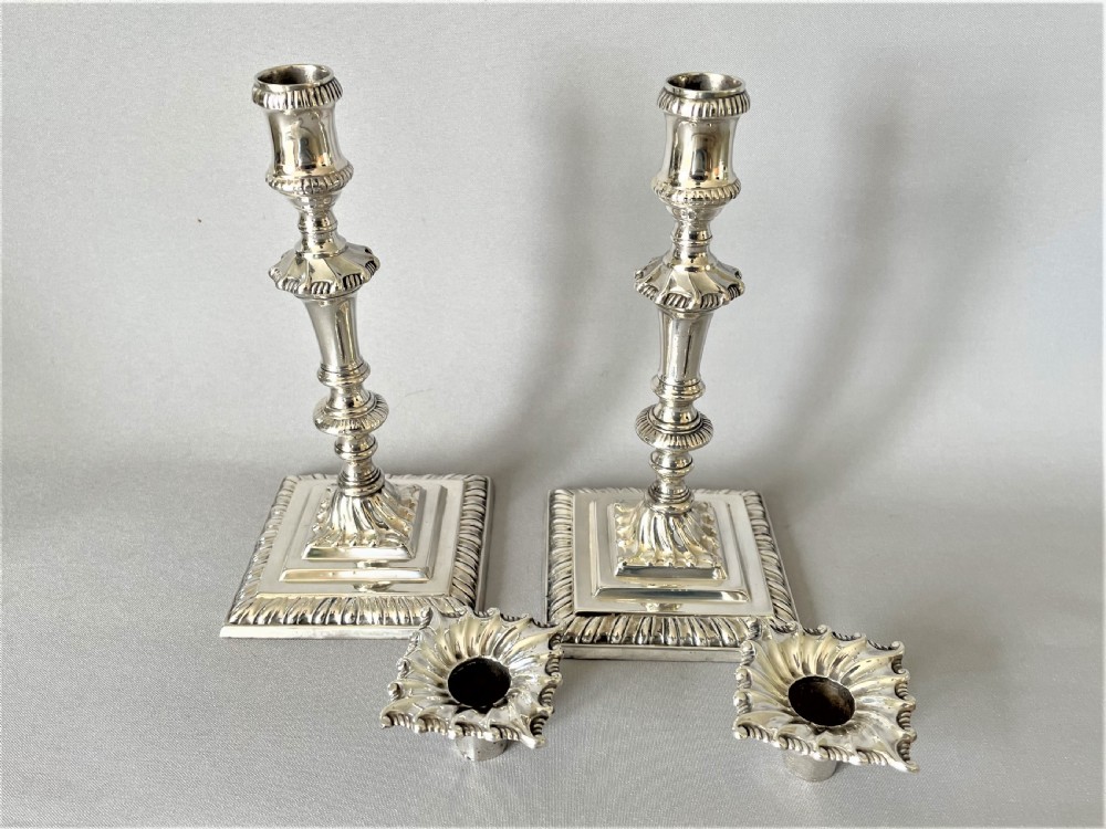 A superb pair of Edwardian silver candlesticks View VI