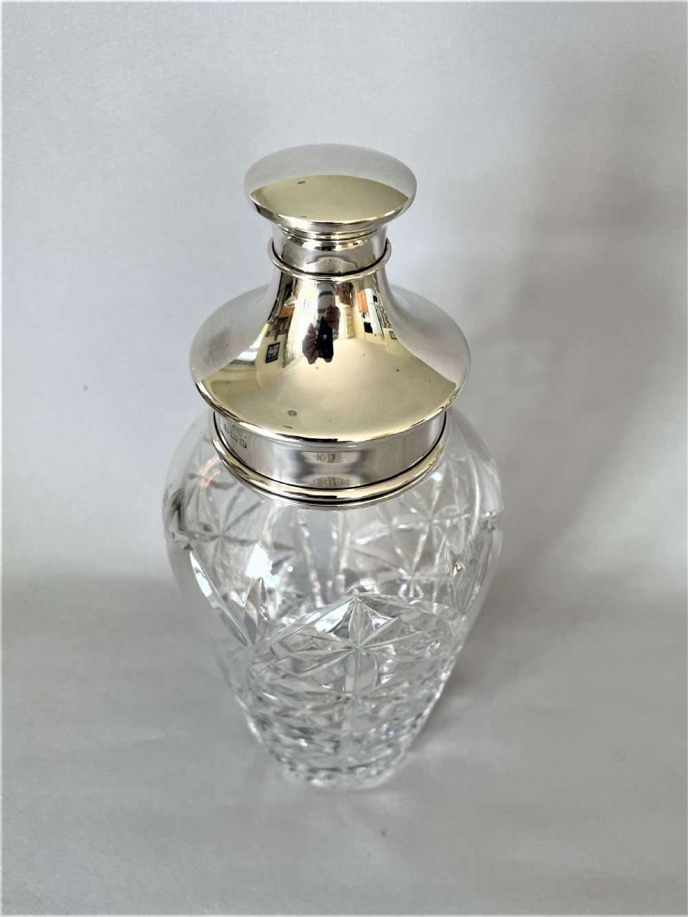 A superb hallmarked silver & cut glass cocktail shaker View II