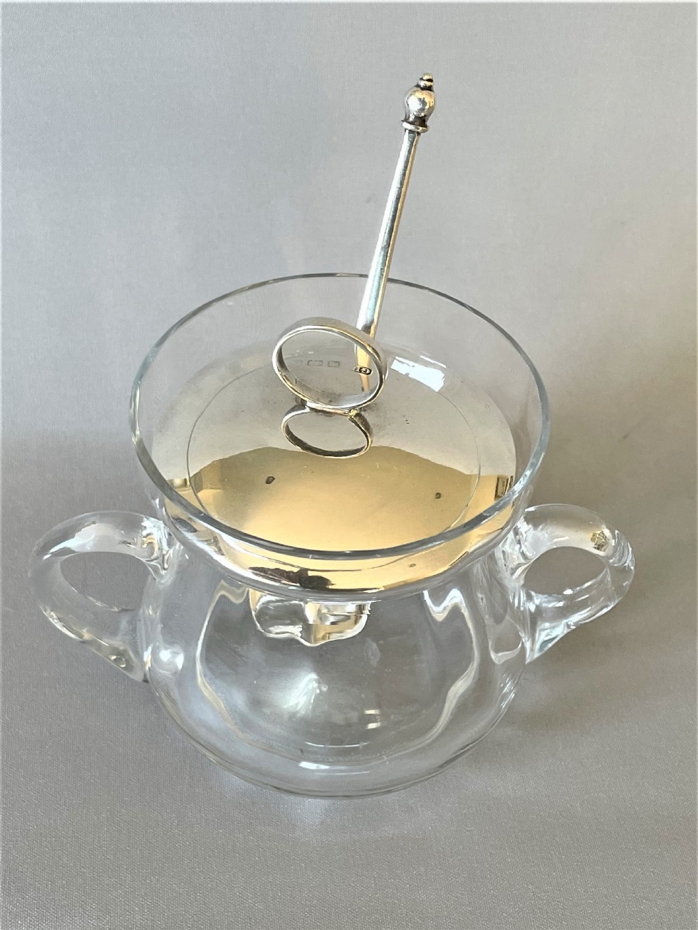 A silver mounted preserve jar with hallmarked silver spoon View VII