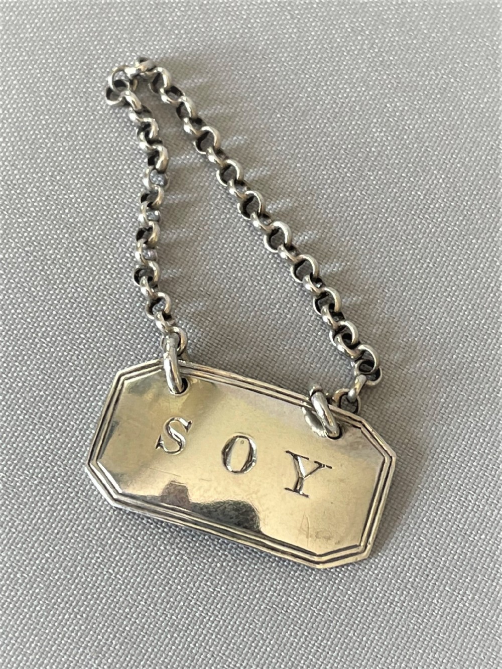 A desirable silver 'Soy' bottle ticket