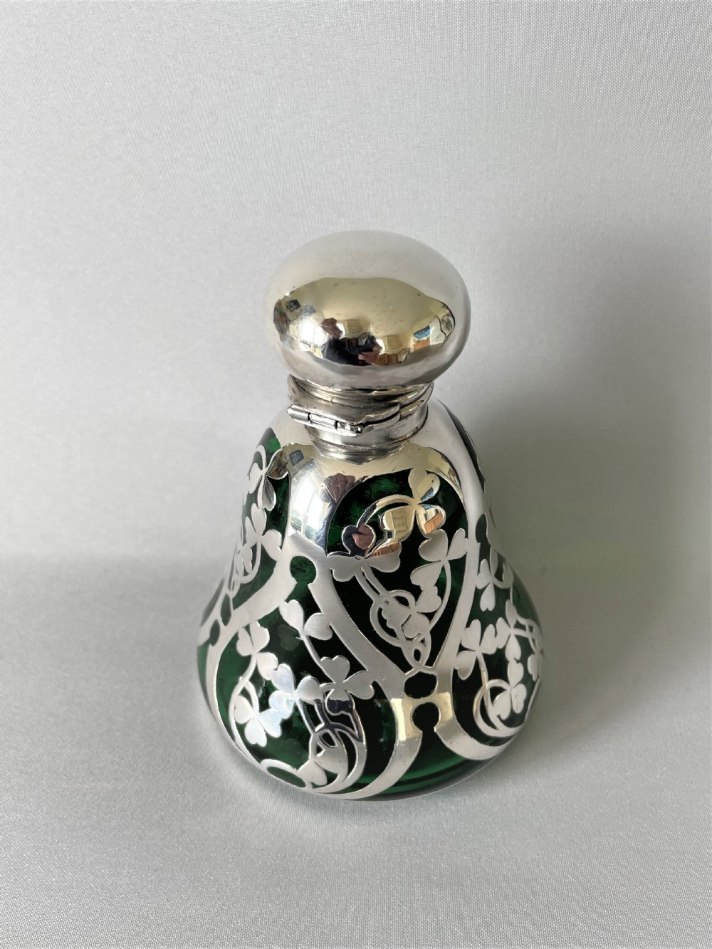 A stunning Art Nouveau silver mounted cologne bottle View II