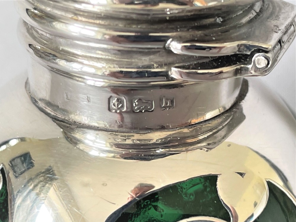 A stunning Art Nouveau silver mounted cologne bottle View V