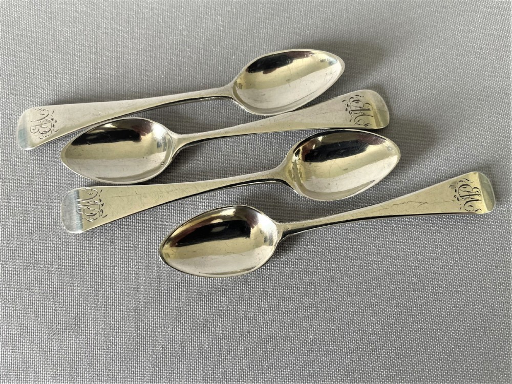 An extremely rare set of  4 Georgian Newcastle silver snuff spoons View II
