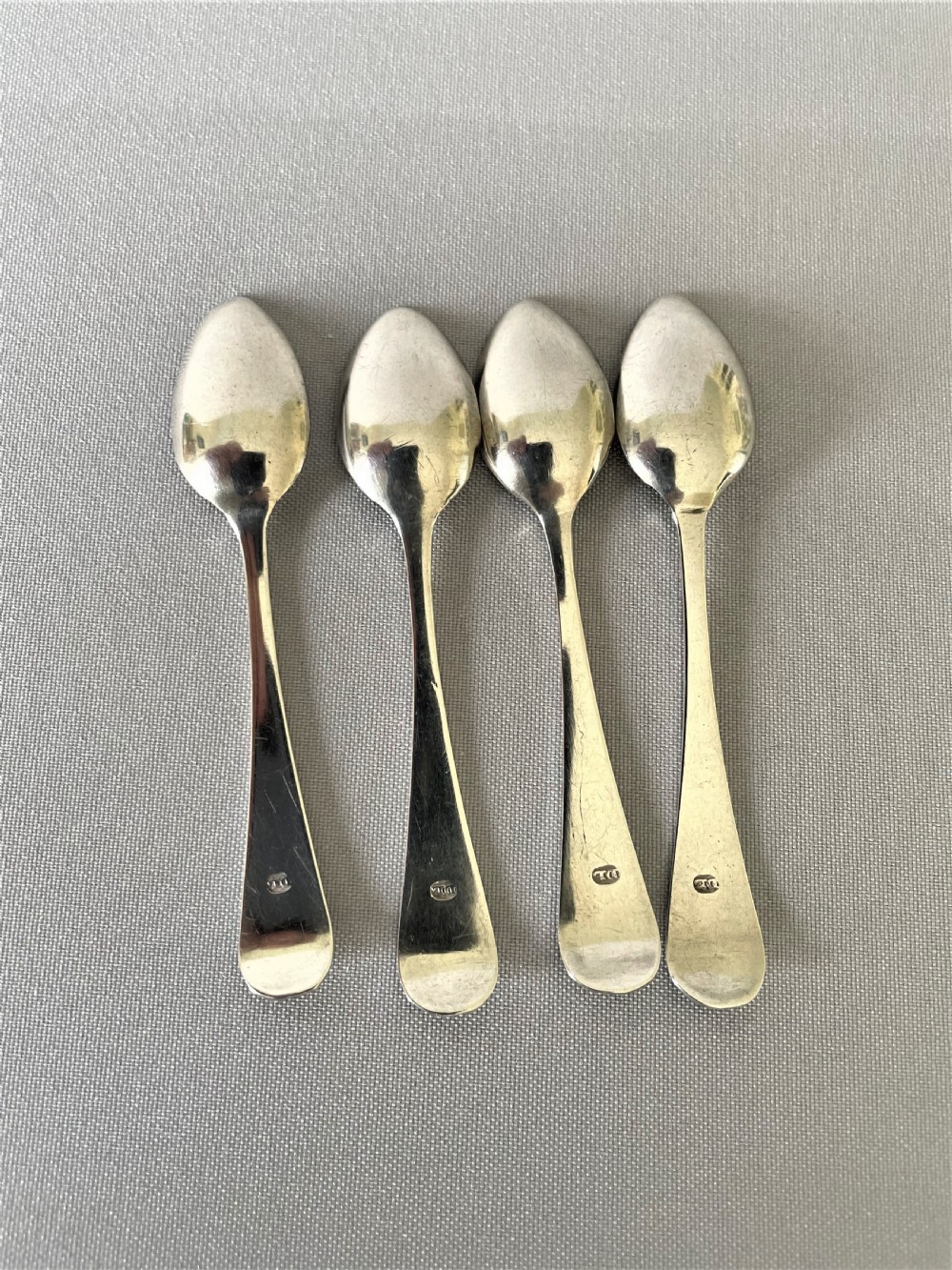 An extremely rare set of  4 Georgian Newcastle silver snuff spoons View III