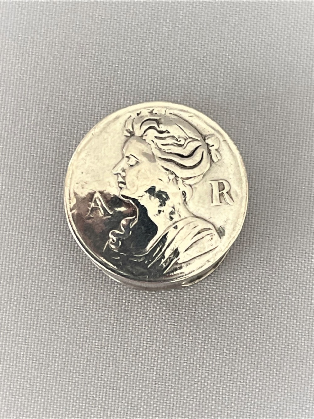 An extremely rare queen Anne silver counter/patch box