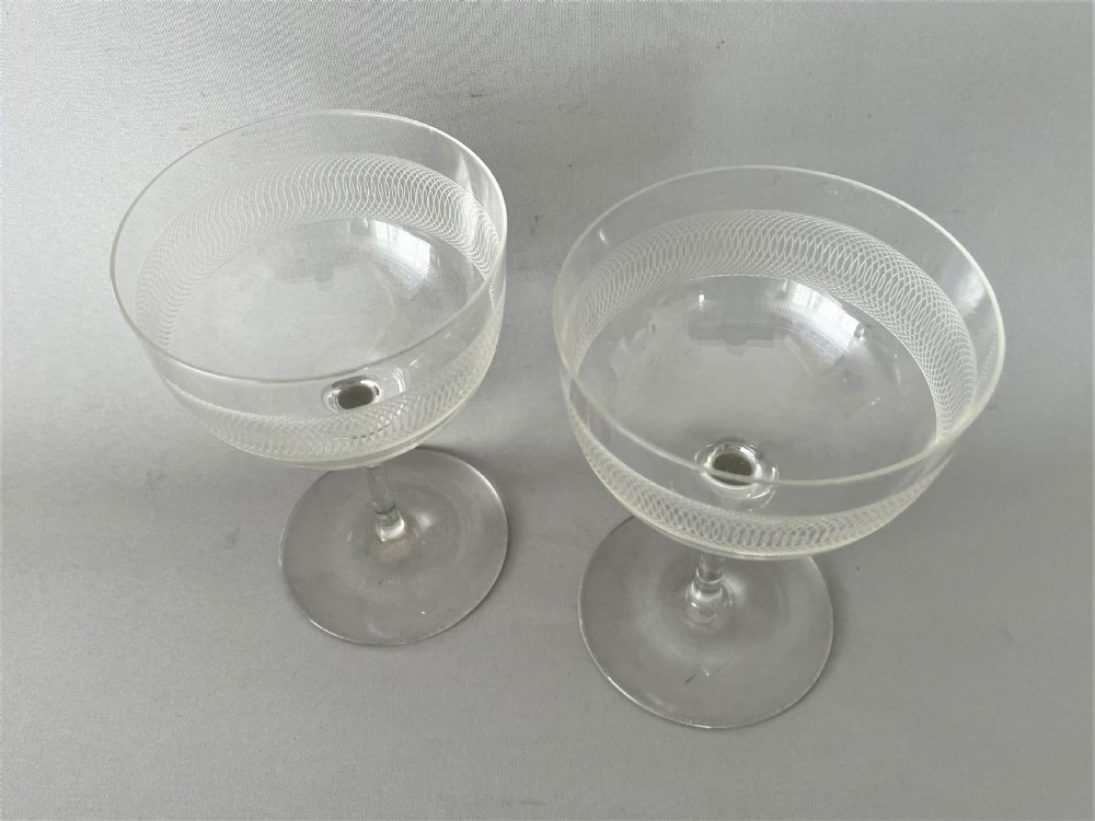 A charming pair of etched Edwardian champagne coupes View III