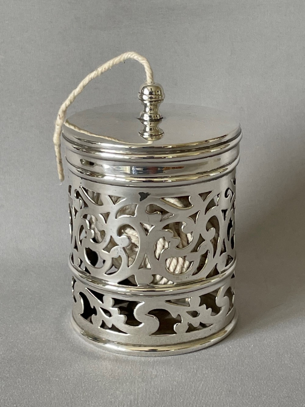 A fabulous Edwardian pierced silver string box