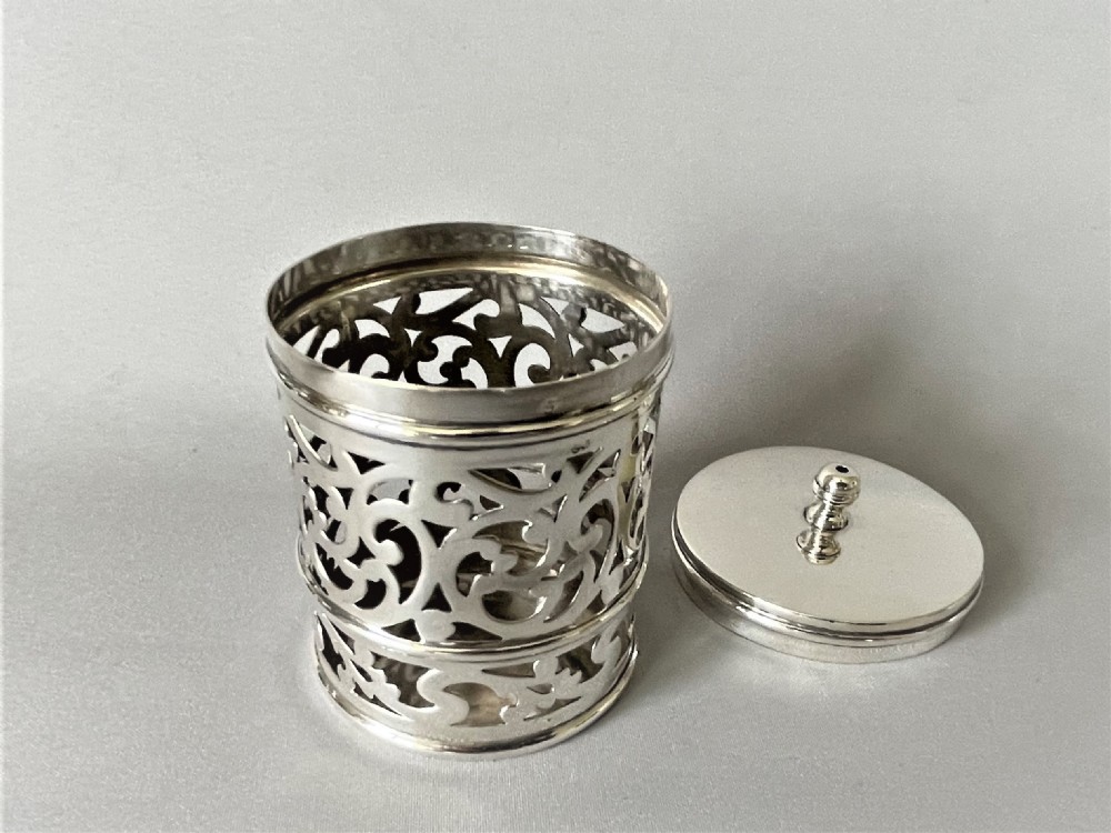 A fabulous Edwardian pierced silver string box View VI