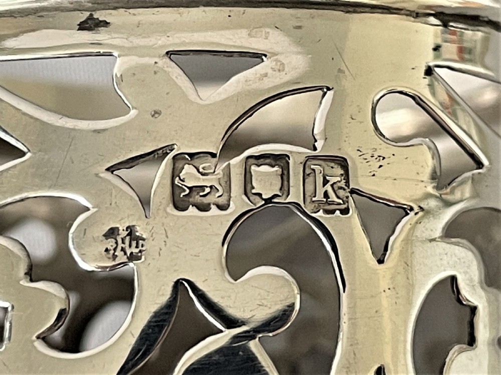 A fabulous Edwardian pierced silver string box View VIII