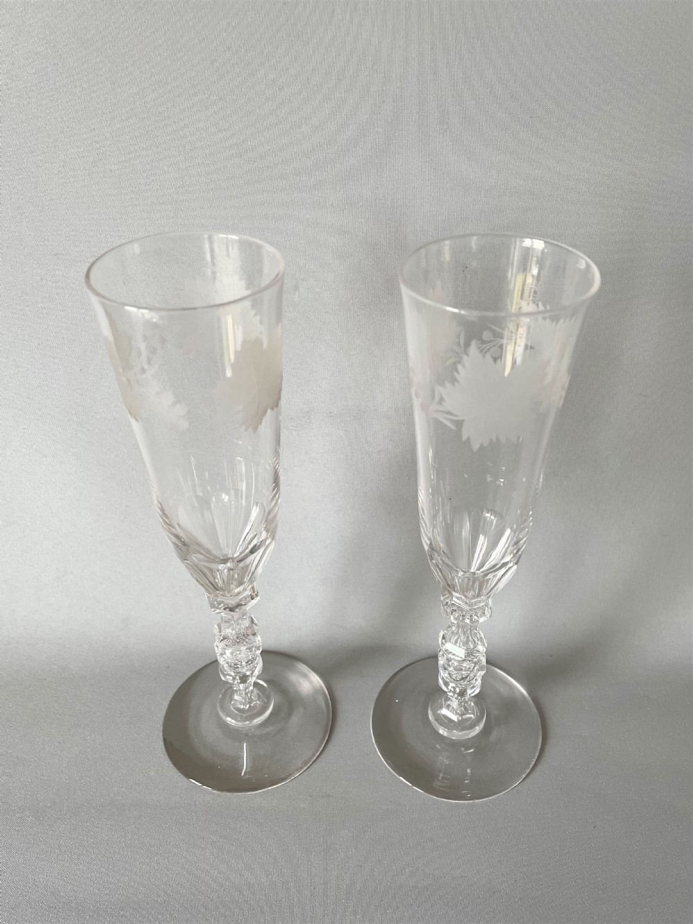 A stunning pair of Victorian cut & etched champagne flutes View II