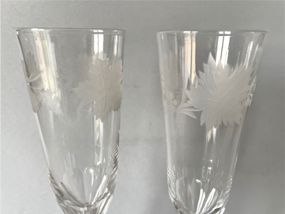 A stunning pair of Victorian cut & etched champagne flutes View V