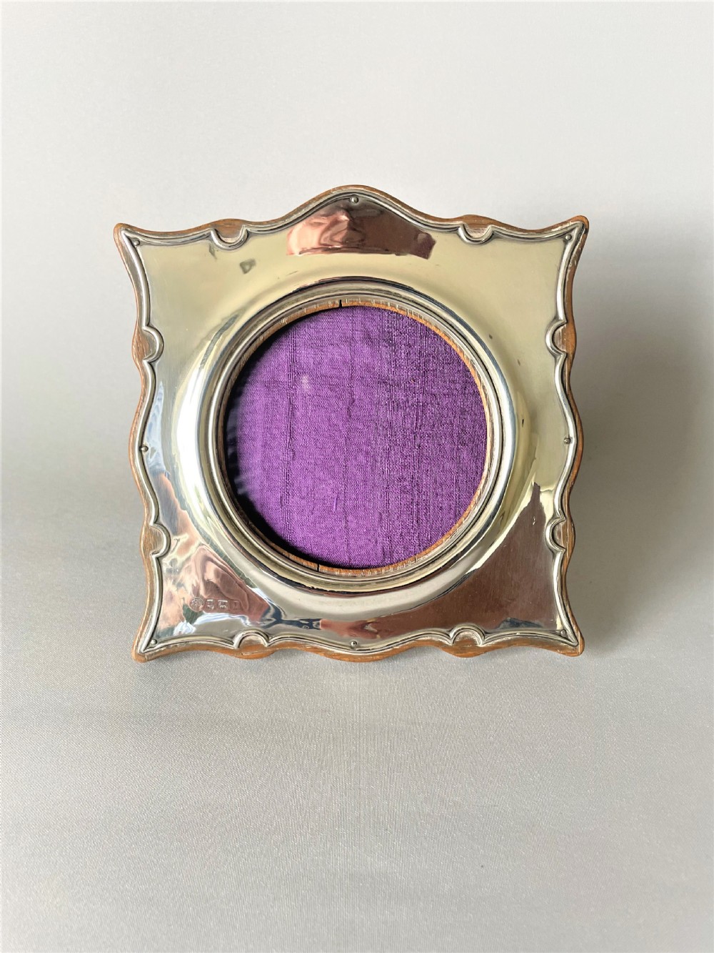 A charming shaped Edwardian silver photo frame View II