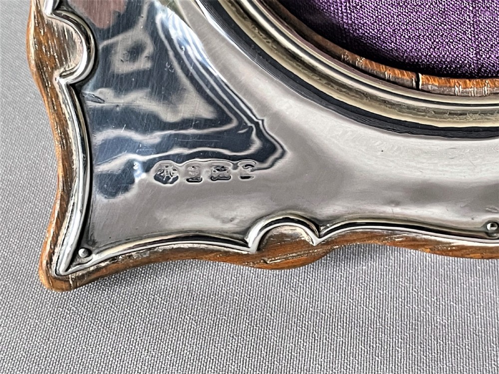 A charming shaped Edwardian silver photo frame View IV