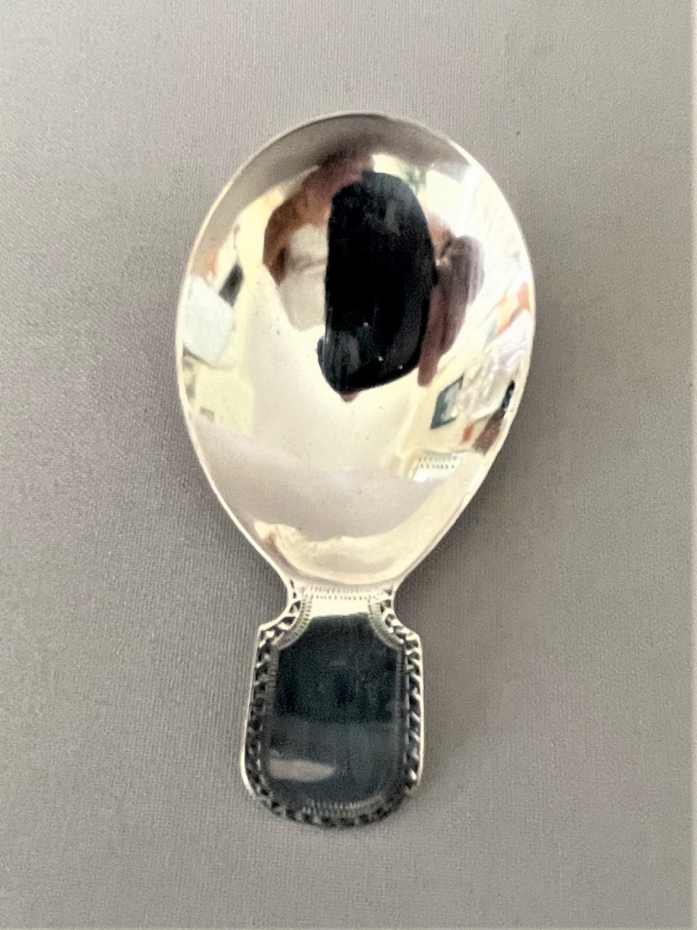 A delightful Georgian silver caddy spoon