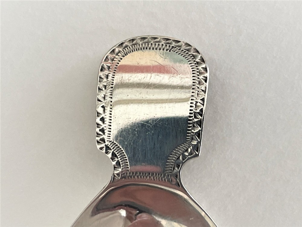A delightful Georgian silver caddy spoon View IV