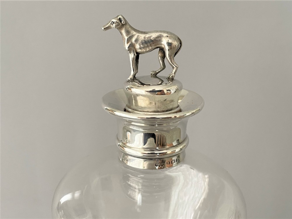 A rare Victorian silver mounted decanter with greyhound stopper View III