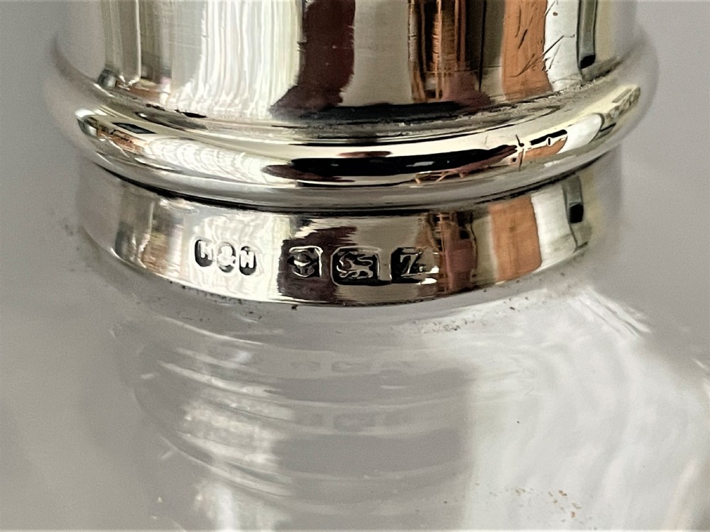 A rare Victorian silver mounted decanter with greyhound stopper View VI