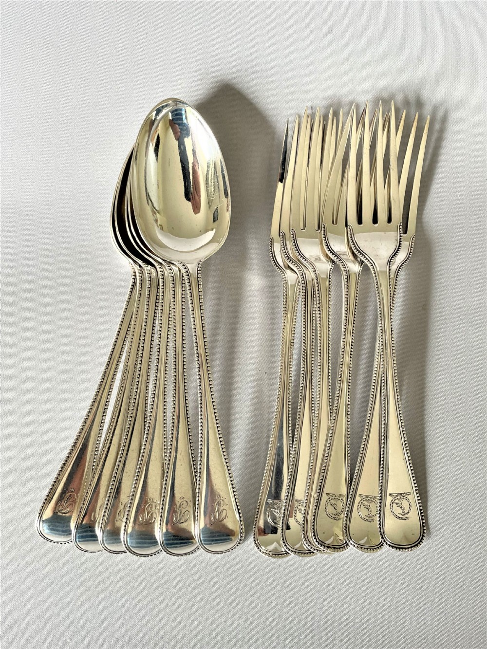 A wonderful 12 piece Victorian silver dessert in bead pattern