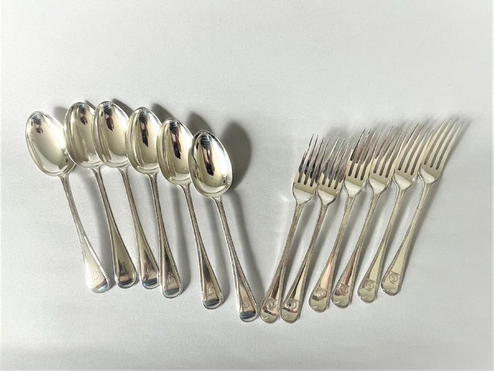 A wonderful 12 piece Victorian silver dessert in bead pattern View II