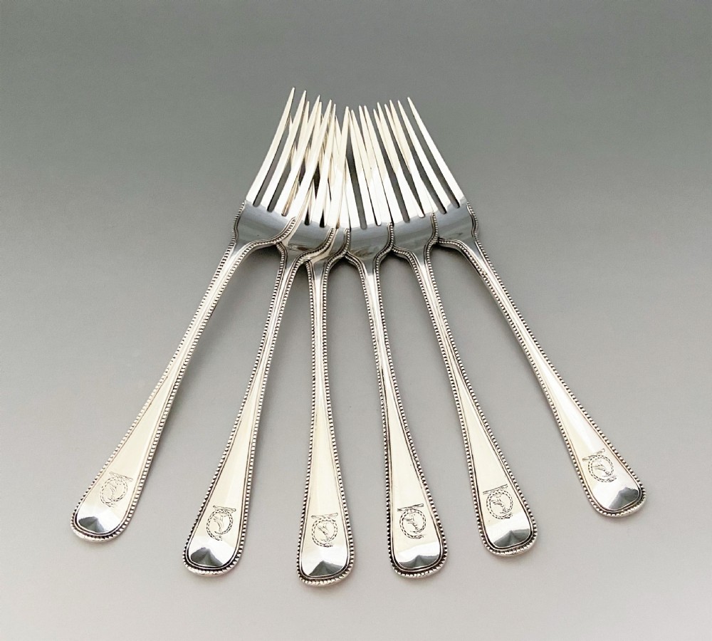 A wonderful 12 piece Victorian silver dessert in bead pattern View III