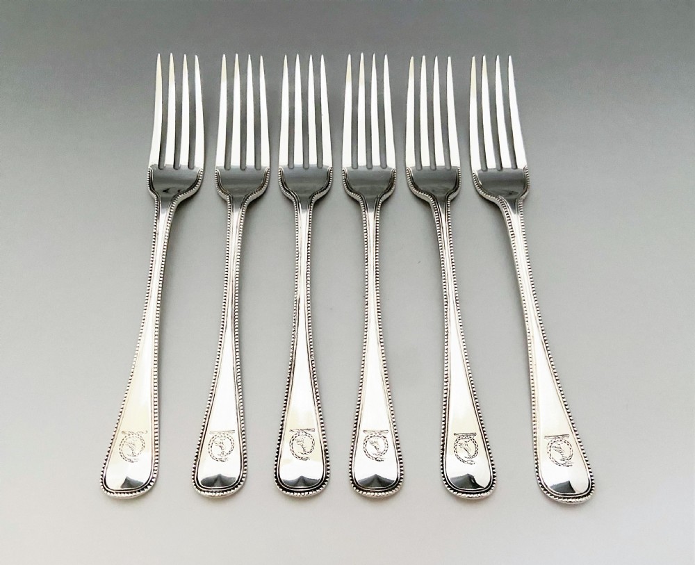 A wonderful 12 piece Victorian silver dessert in bead pattern View V