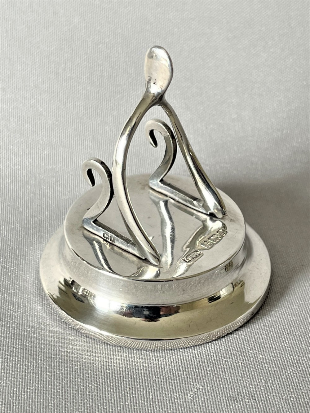 A novelty Edwardian silver wishbone name card/menu holder View III