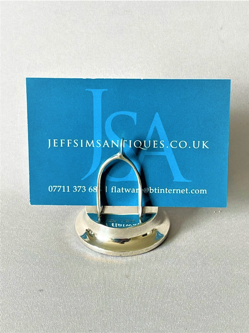 A novelty Edwardian silver wishbone name card/menu holder View VI
