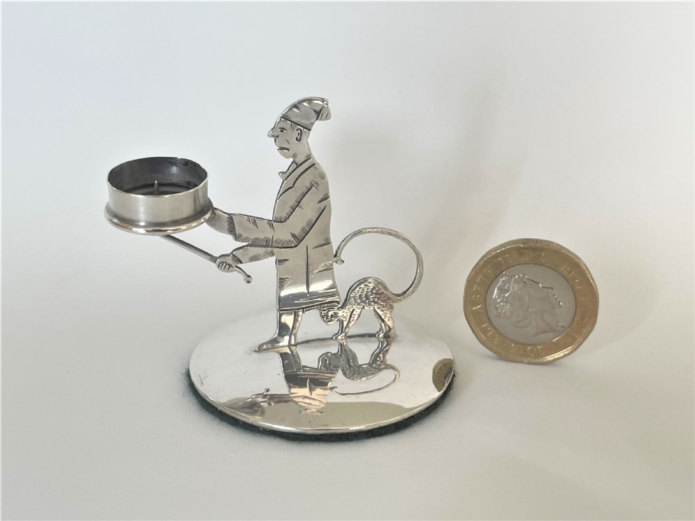 An Edwardian novelty miniature silver go-to-bed