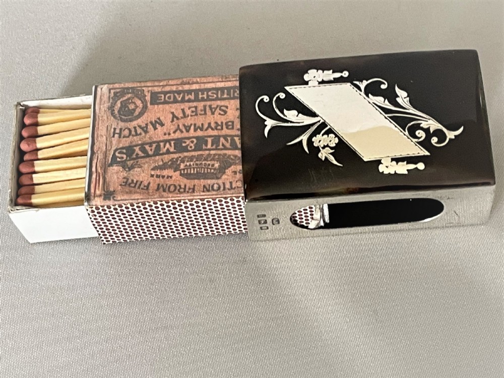 A superb silver & tortoiseshell match box holder View VII