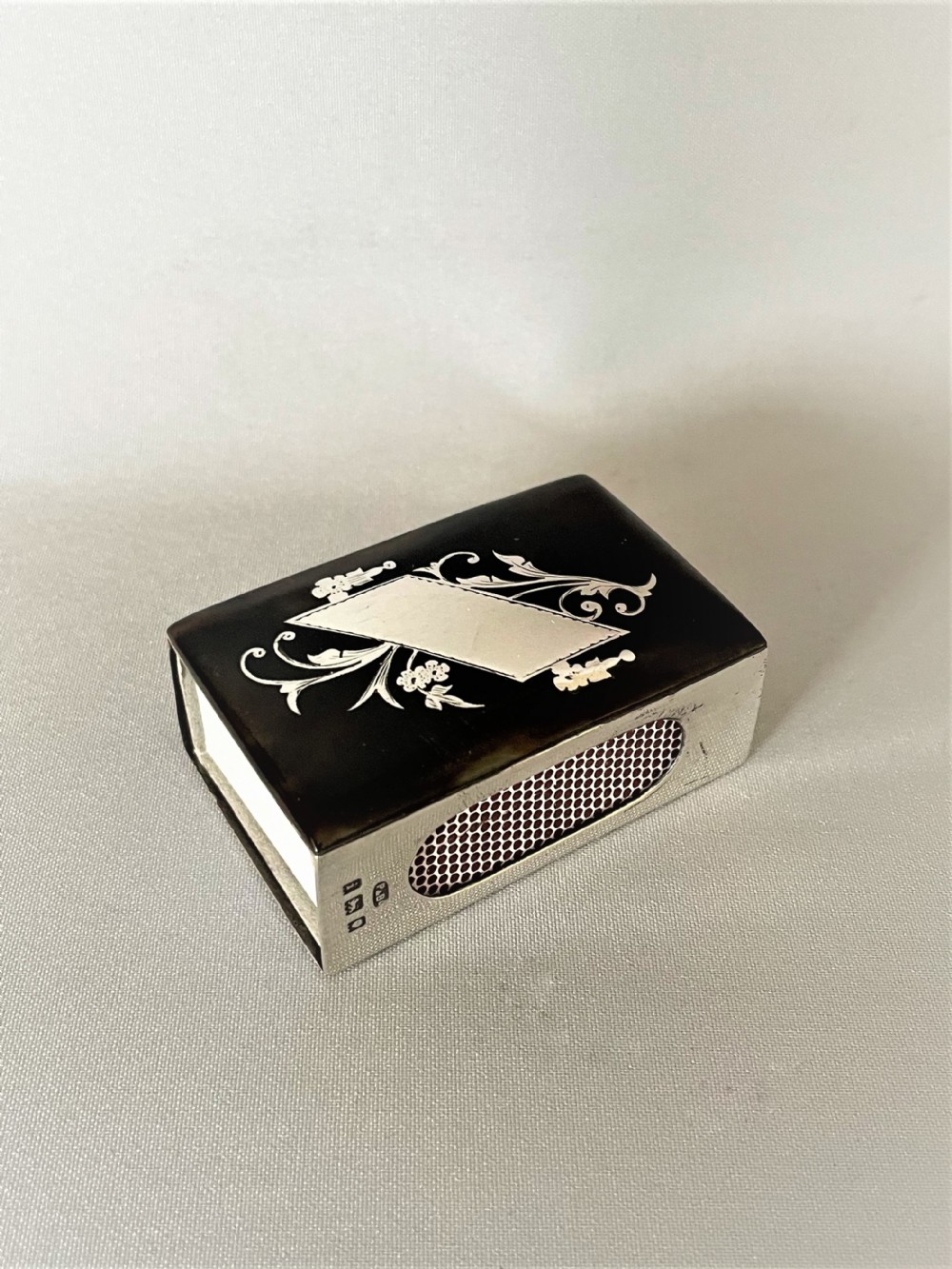 A superb silver & tortoiseshell match box holder