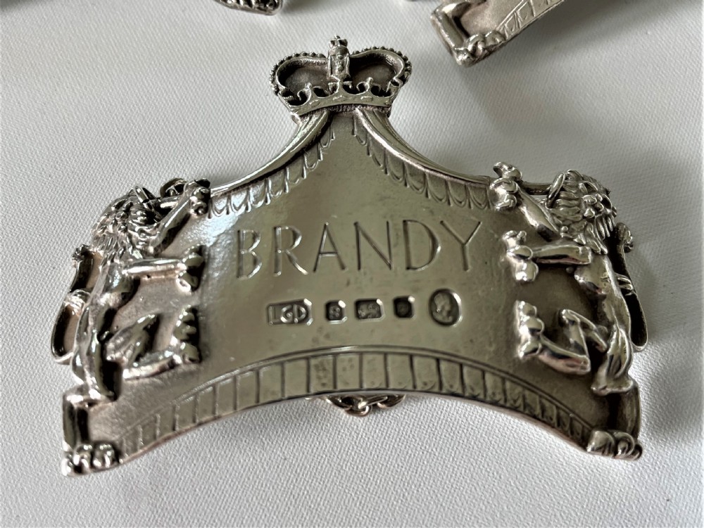 A spectacular set of 3 Leslie Gorden Durbin silver Coronation decanter labels View II