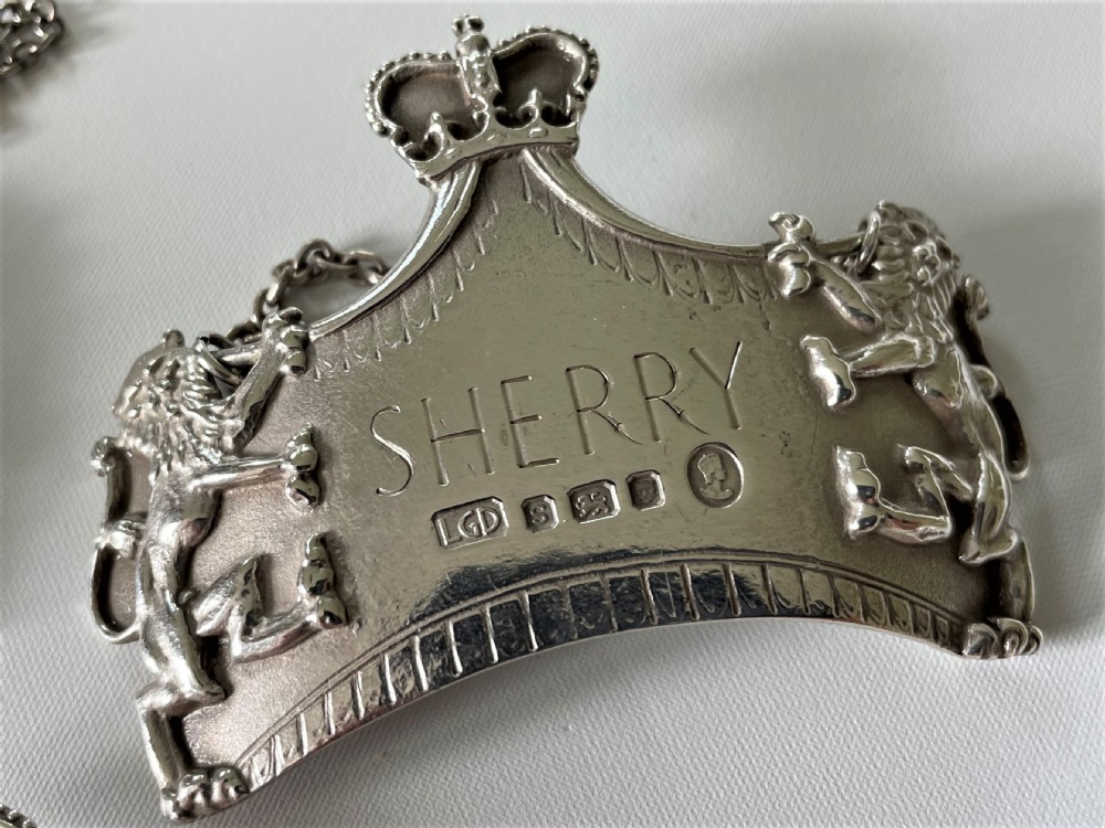 A spectacular set of 3 Leslie Gorden Durbin silver Coronation decanter labels View III