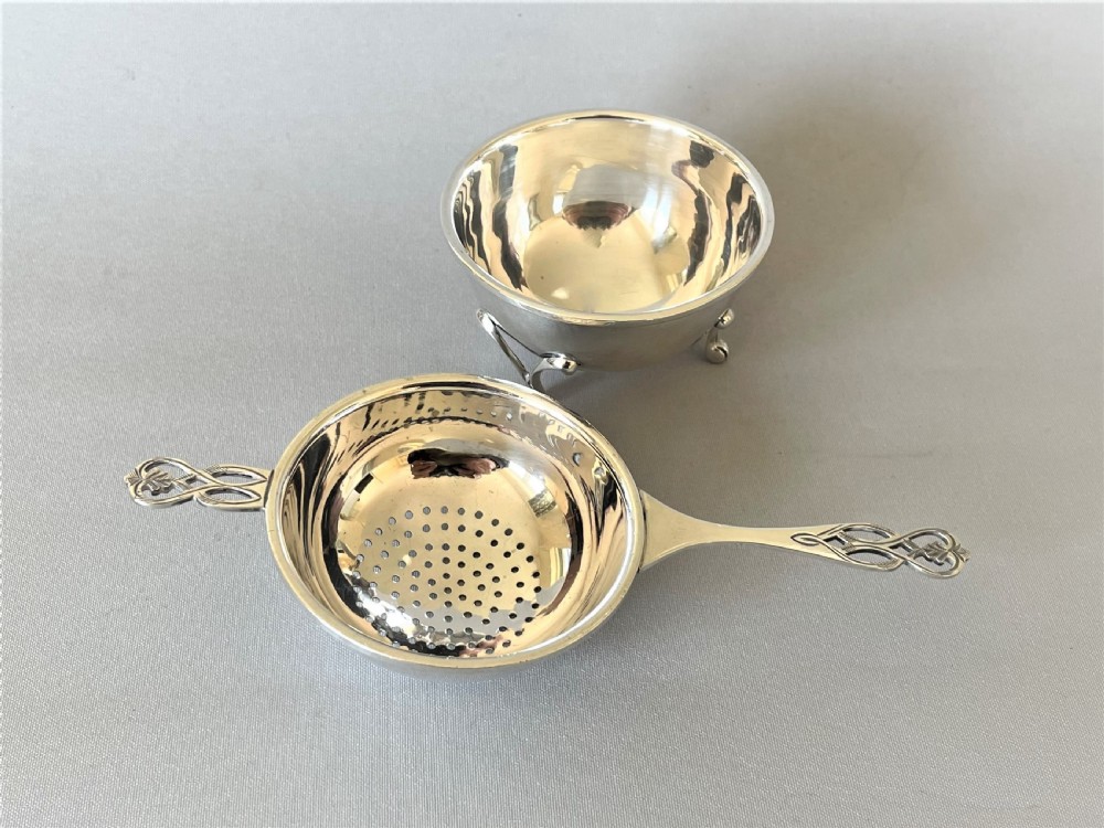 A handsome silver tea strainer & matching drip cup View III