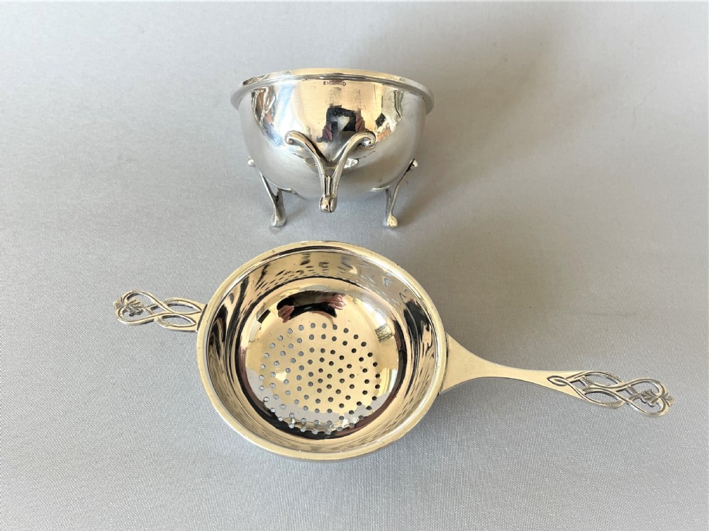 A handsome silver tea strainer & matching drip cup View IV