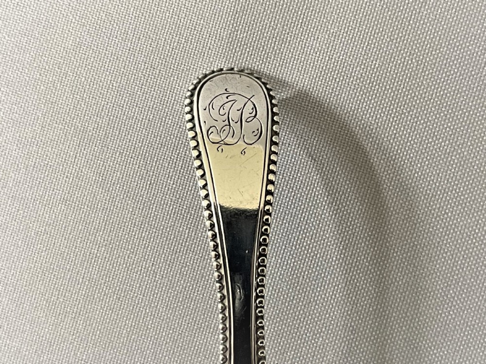 A bead pattern George III silver caddy spoon View II