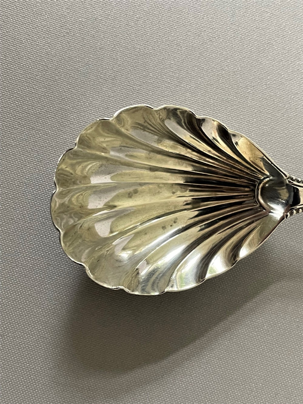 A bead pattern George III silver caddy spoon View III