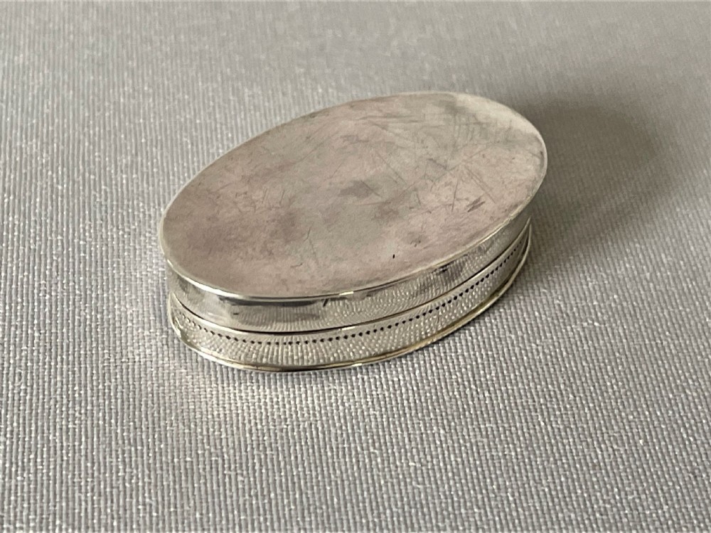 An oval 18th Century silver patch box View II
