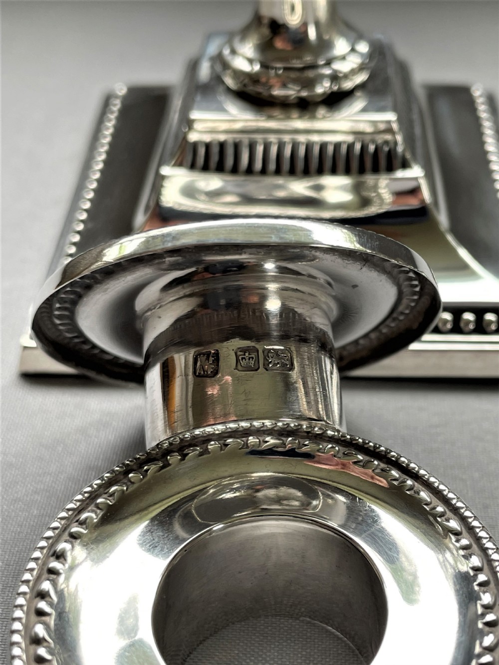 A Charming pair of Edwardian silver dwarf candle sticks View VII
