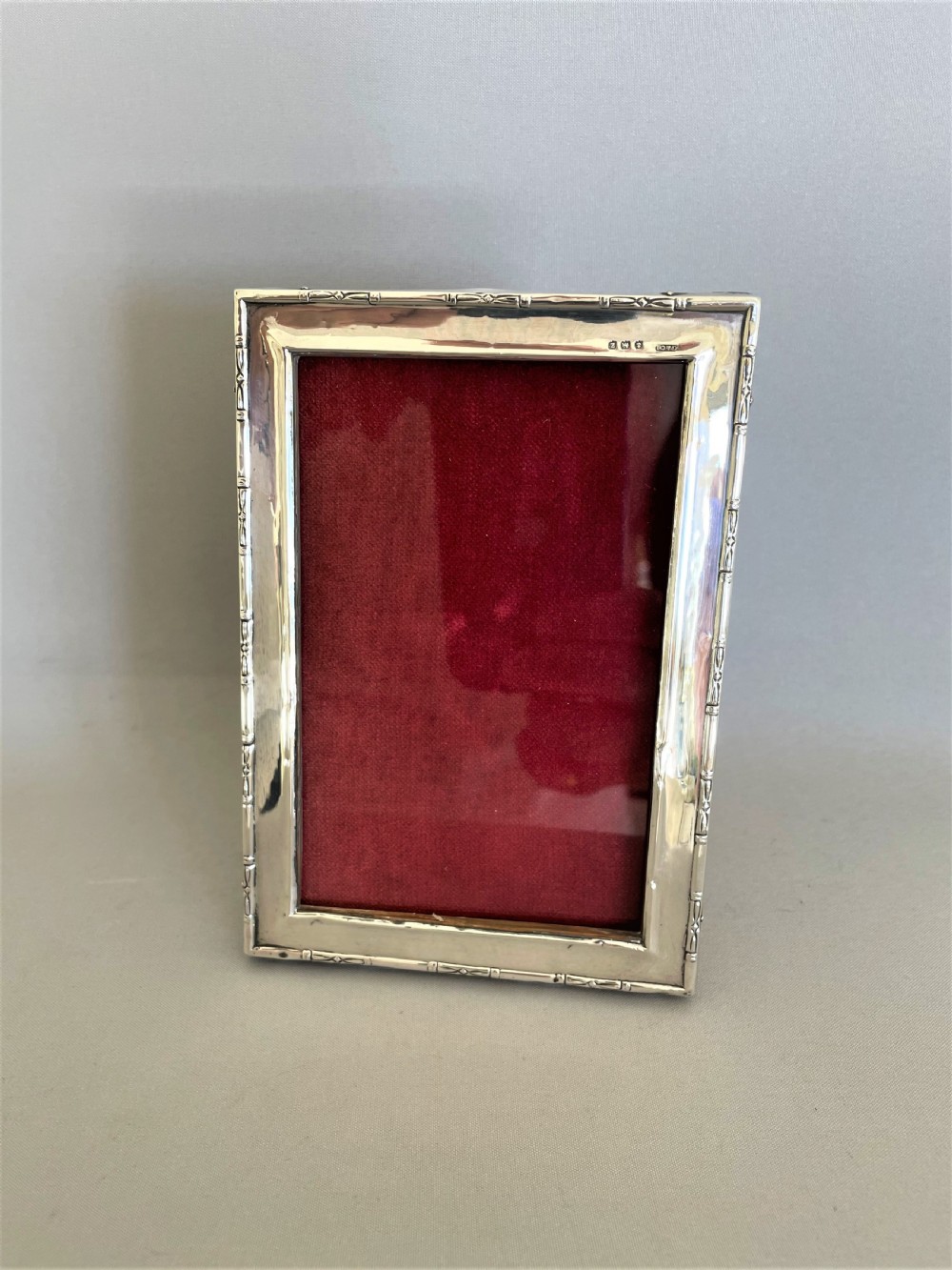 A small silver landscape/portrait photo frame View III