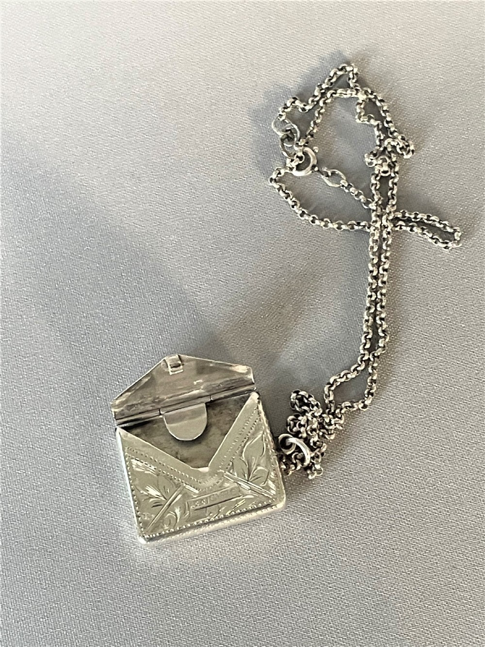 A Chester silver silver stamp envelope & chain View III