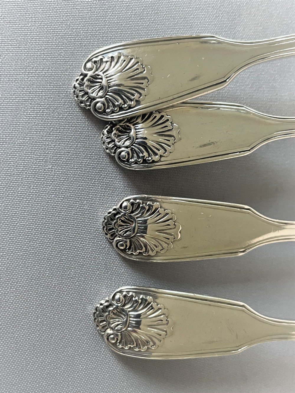A rare set of 4 silver fiddle, thread & husk pattern teaspoons View II