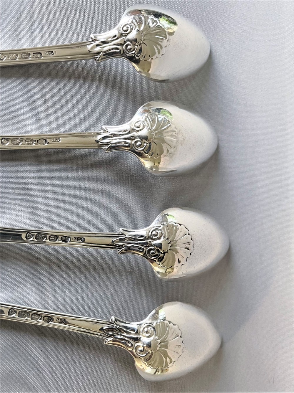A rare set of 4 silver fiddle, thread & husk pattern teaspoons View IV