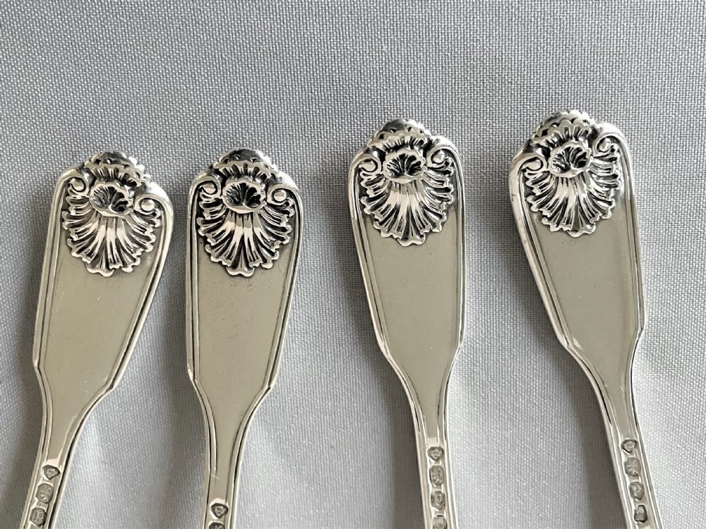 A rare set of 4 silver fiddle, thread & husk pattern teaspoons View V