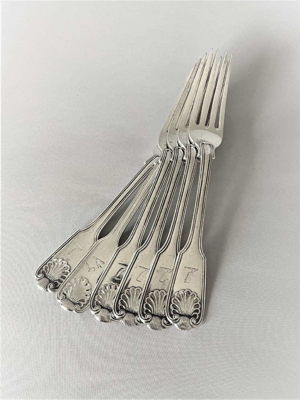 A matched set of 6 fiddle, thread & shell table forks View II
