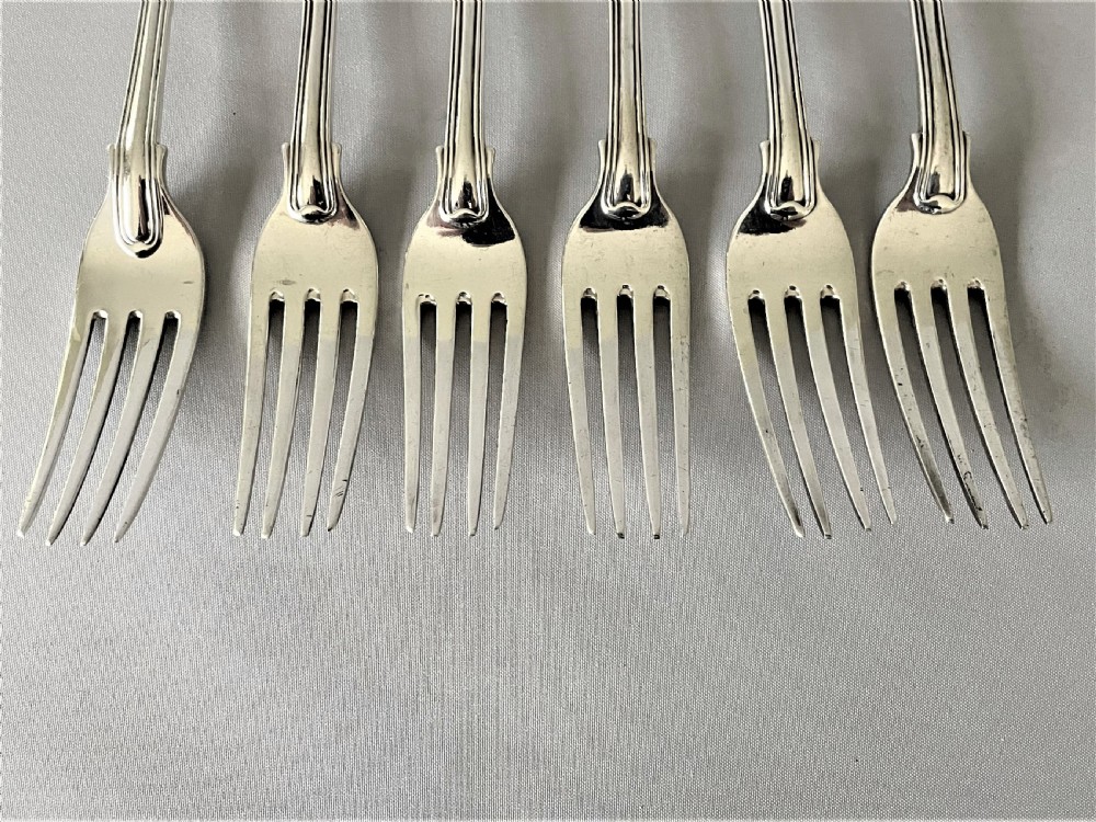A matched set of 6 fiddle, thread & shell table forks View VI