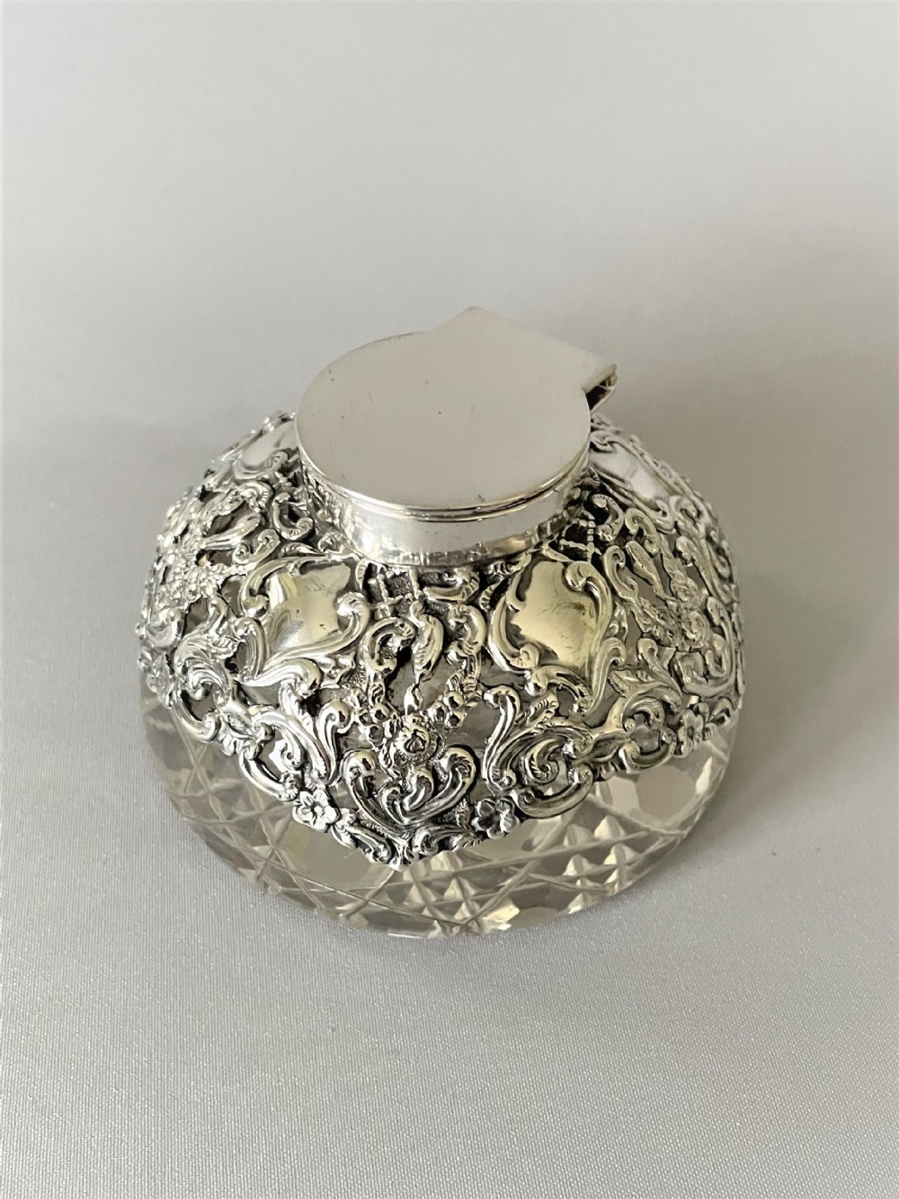 A gorgeous Edwardian silver overlay inkwell