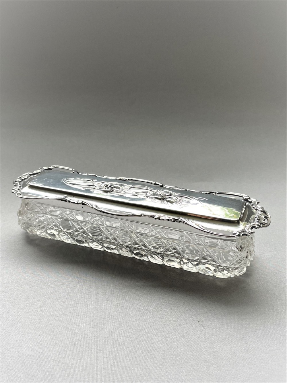 A Fabulous Iris Embossed Silver Topped Trinket Box