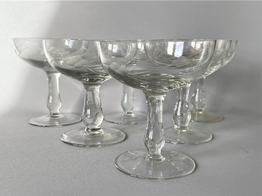 A set of six vintage etched champagne coupes View III