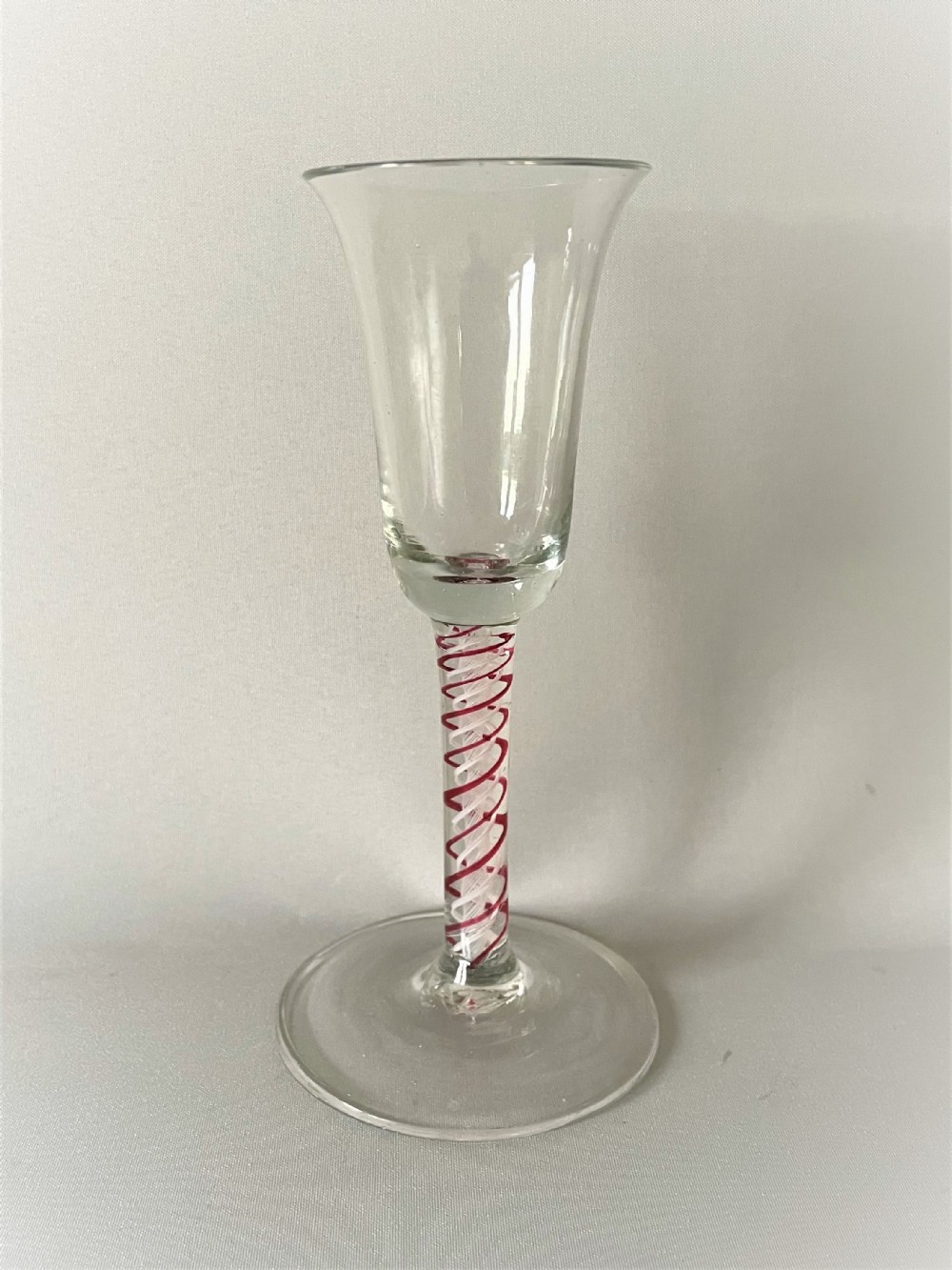 An 18th Century colour twist stem wine glass