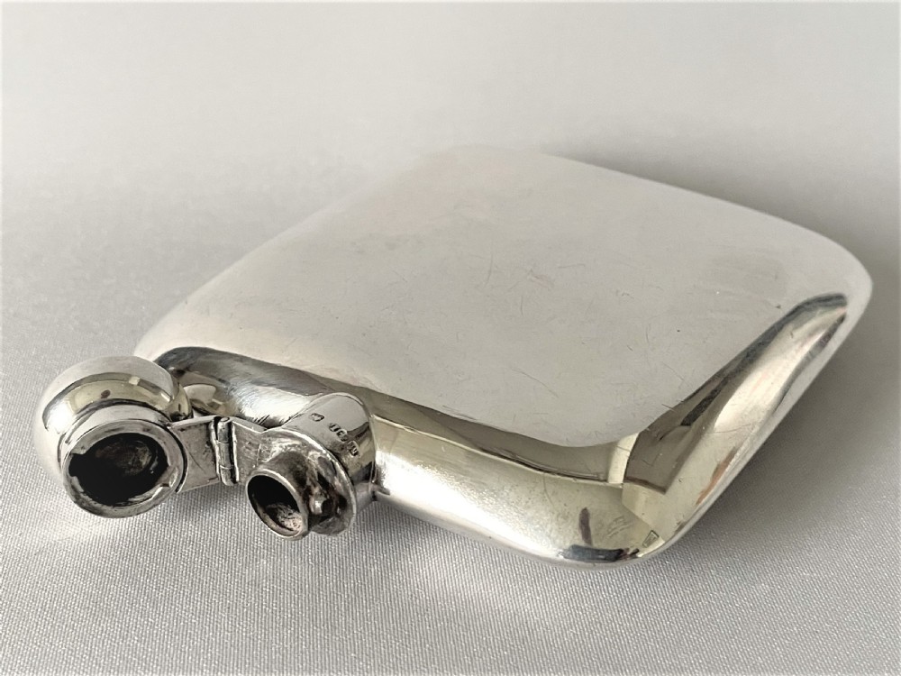 A handsome Victorian silver hipflask View V